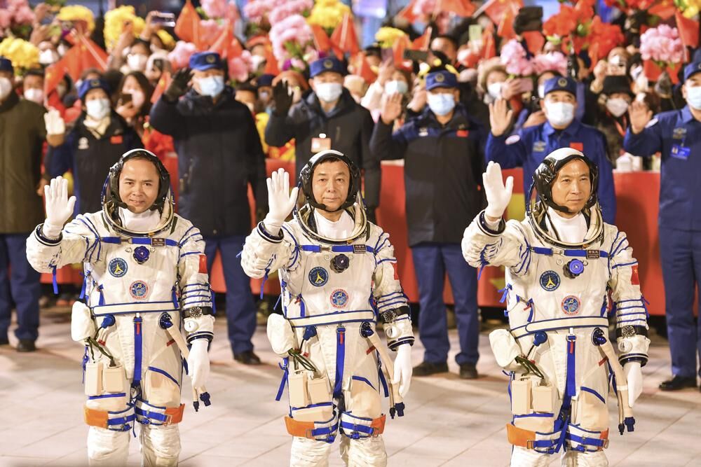 Chinese astronauts Fei Junlong, Deng Qingming and Zhang Lu